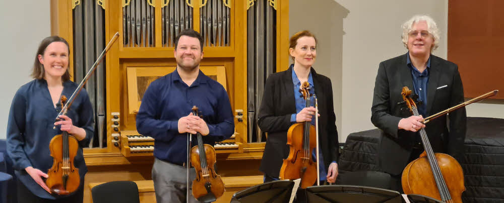 The Dante Quartet, all standing, receiving well-deserved applause.